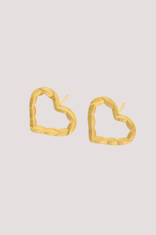 Minimal women stud earrings in heart shape
